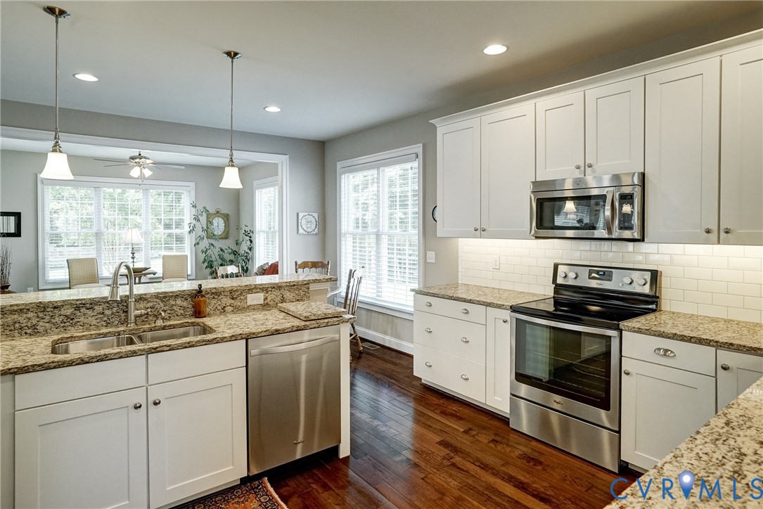 3606 Edenfield Road Midlothian, VA 23113 - Photo 18 of 67 Kitchen featuring white shaker cabinetry, stainles