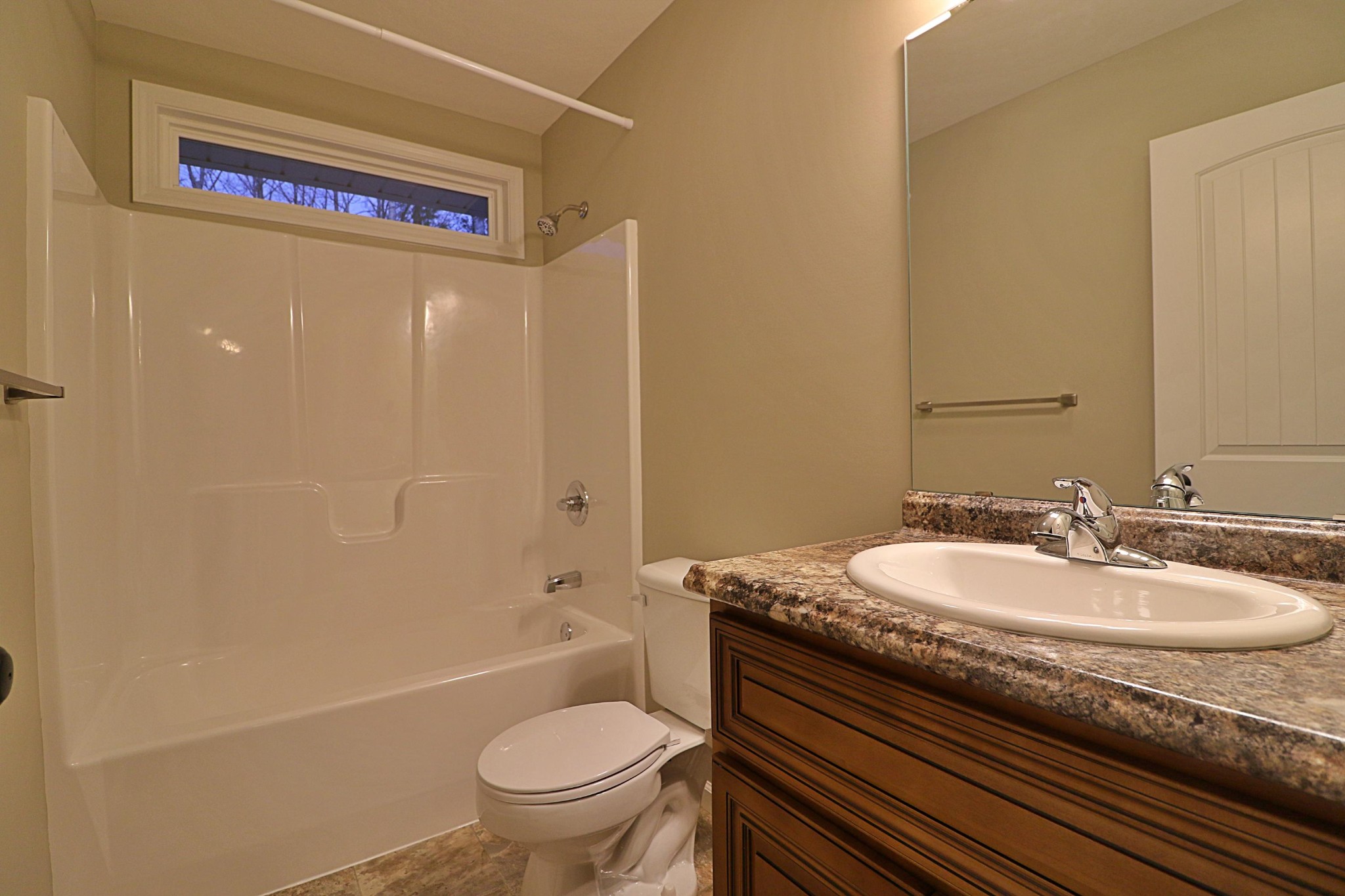 971 Toomey Falls Road Oneida, TN 37841 - Photo 11 of 16 a bathroom with a granite countertop sink toilet and shower