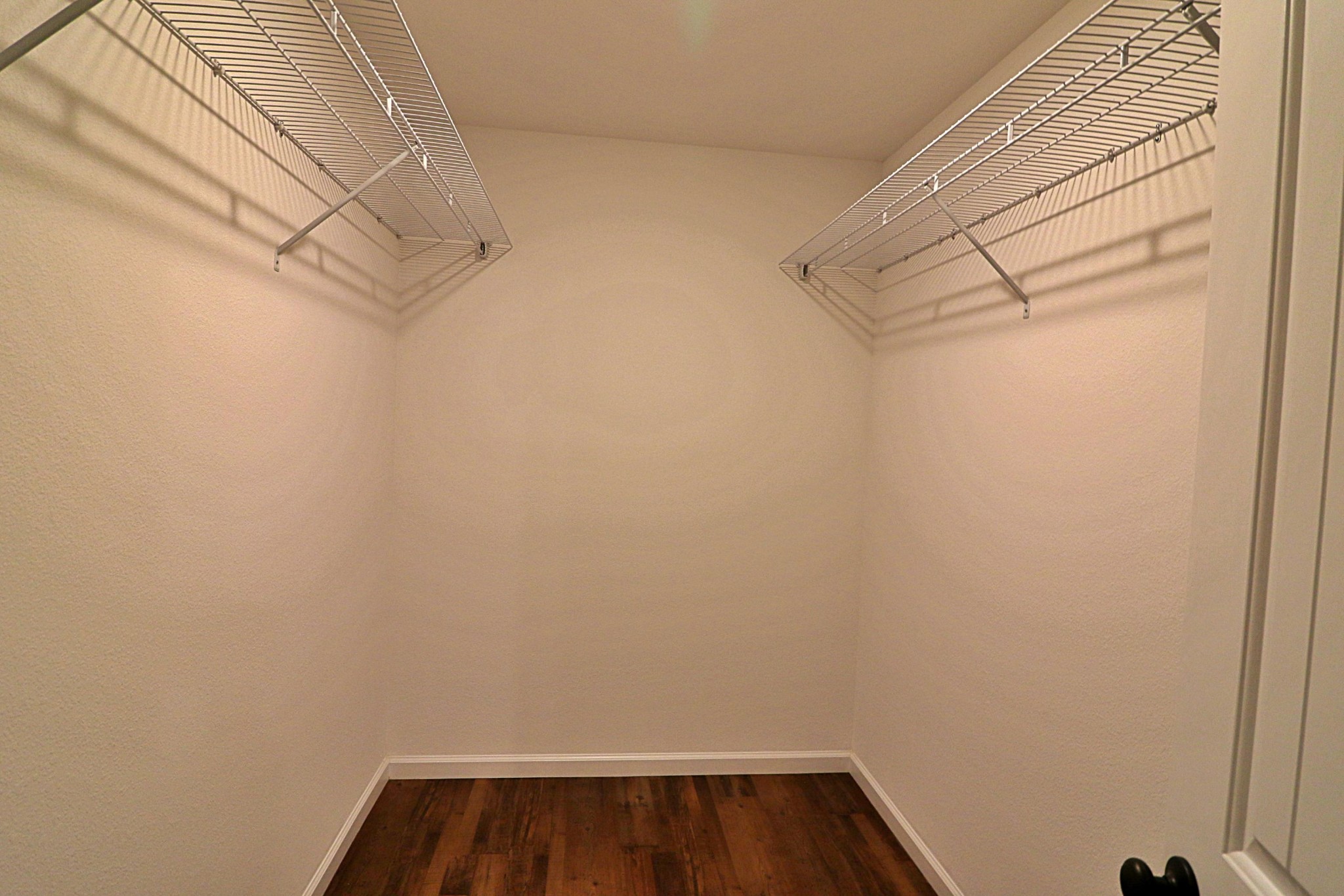 971 Toomey Falls Road Oneida, TN 37841 - Photo 12 of 16 a view of walk in closet with empty racks