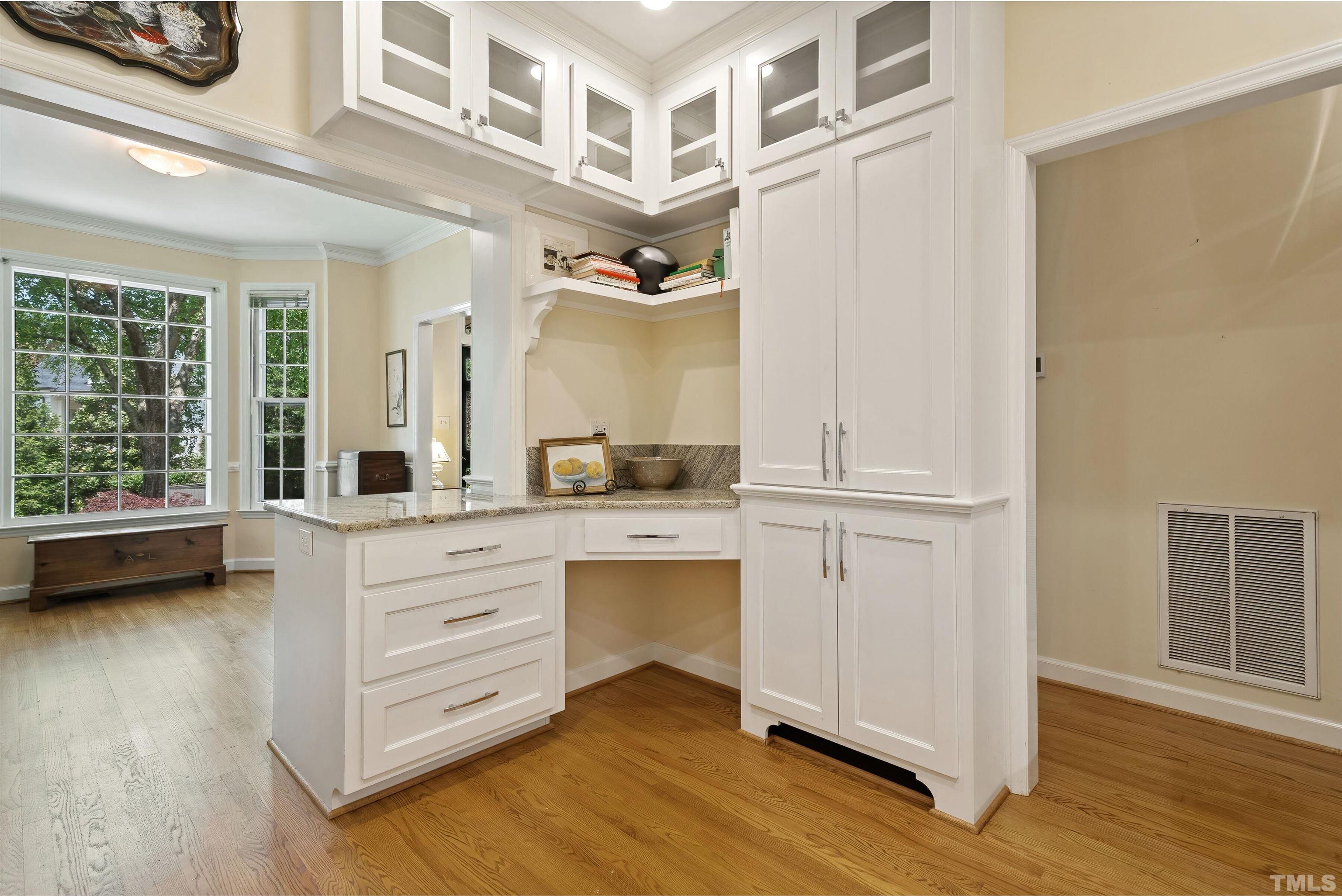 2623 Ashland Street Raleigh, NC 27608 - Photo 5 of 18 a view of walk in closet with window