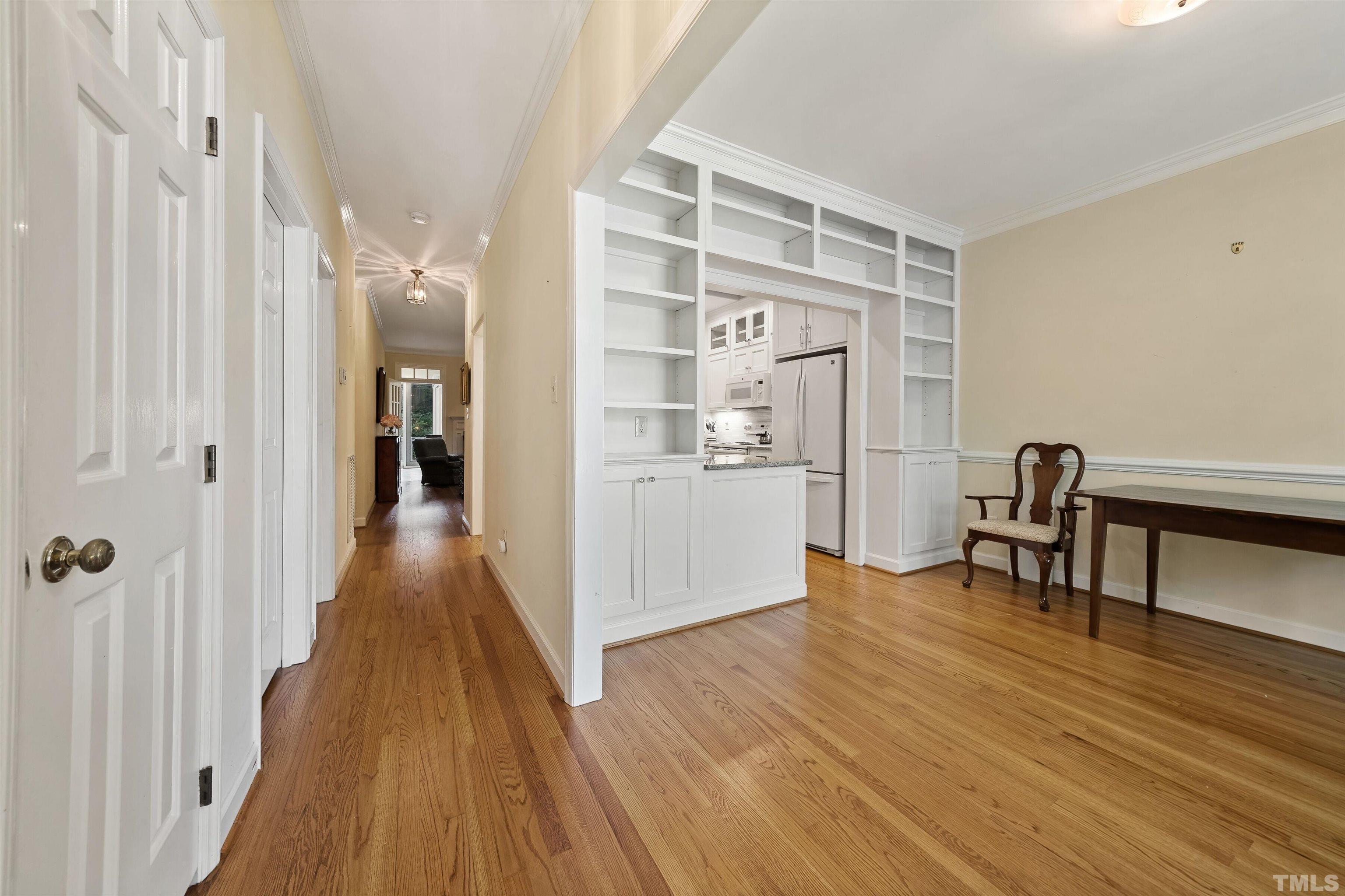 2623 Ashland Street Raleigh, NC 27608 - Photo 6 of 18 a view of a livingroom with wooden floor and furniture
