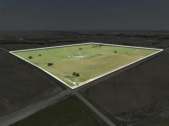 a view of a pool with lawn chairs