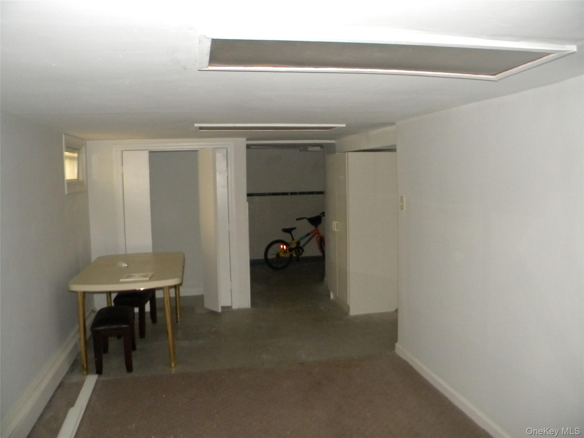 241-26 86th Road Queens, NY 11426 - Photo 25 of 38 a view of a livingroom with furniture