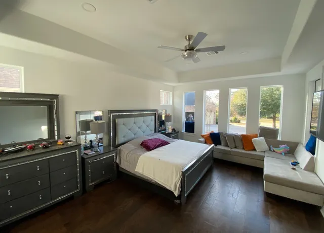 a bedroom with a bed and furniture