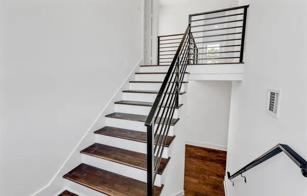 a view of entryway with wooden floor