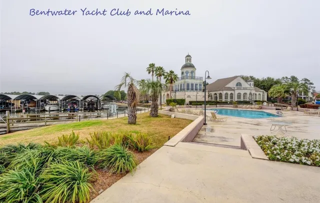 a view of swimming pool with outdoor seating