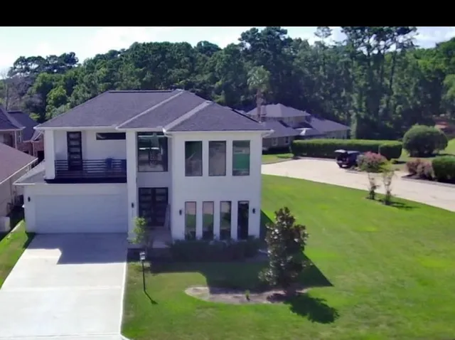 a view of a house with a garden