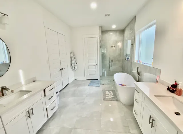 a living room with a table chairs and a table