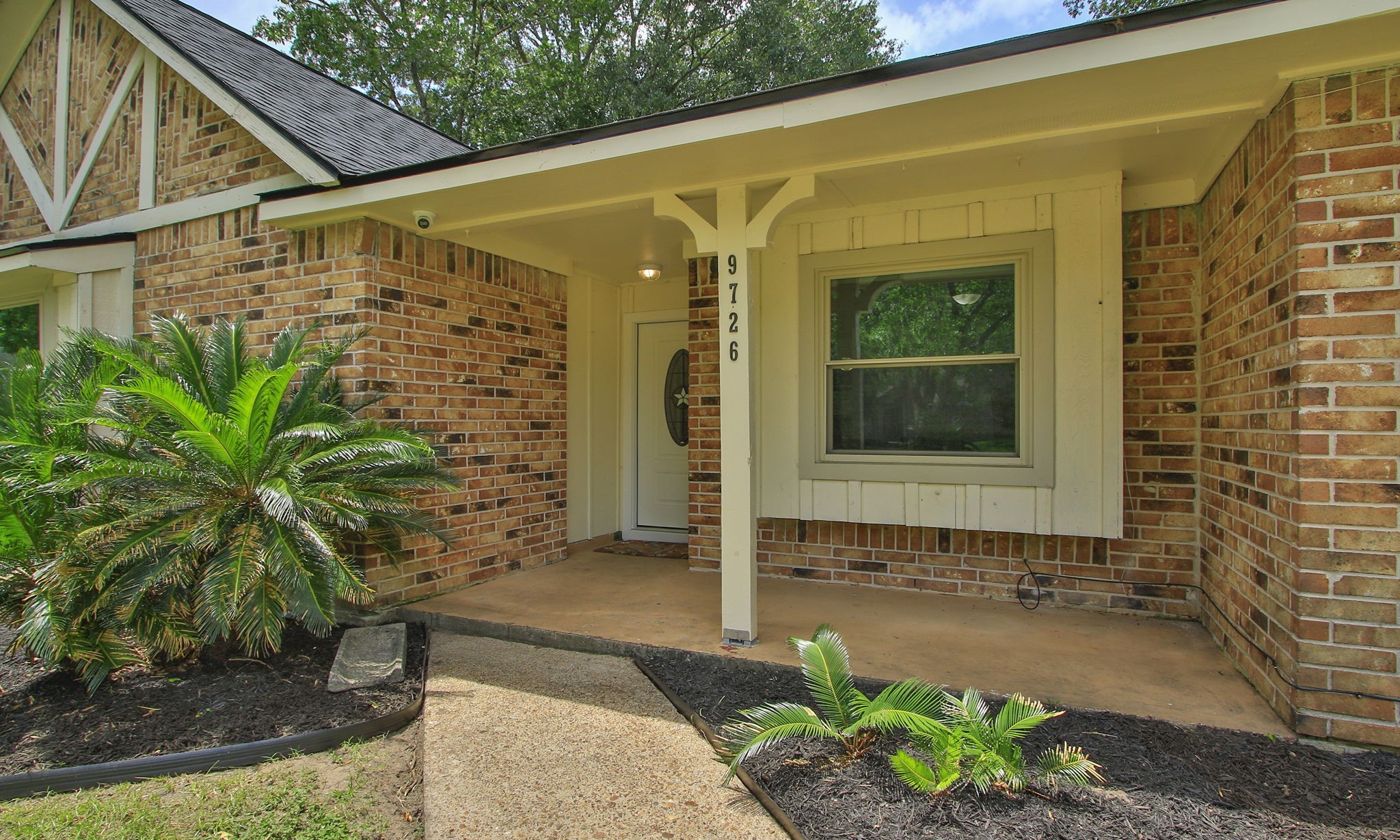 9726 John Bank Drive Spring, TX 77379 - Photo 34 of 36 Large welcoming porch