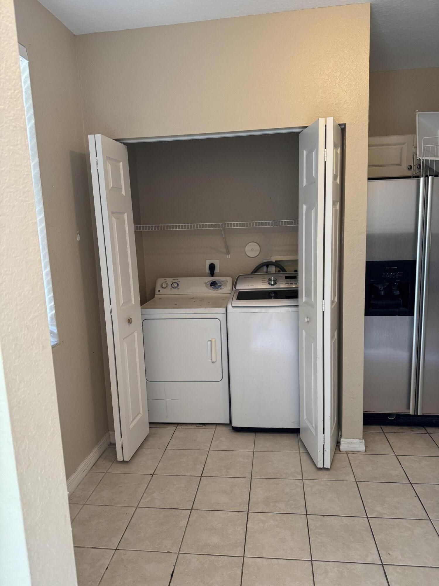 1992 Alamanda Way Riviera Beach, FL 33404 - Photo 4 of 14 Laundry closet