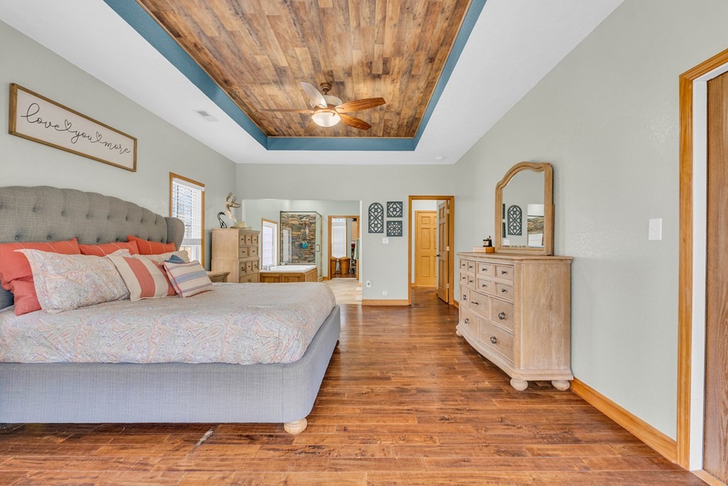 700 Falls Road Monterey, TN 38574 - Photo 20 of 72 a bedroom with a bed and wooden floor