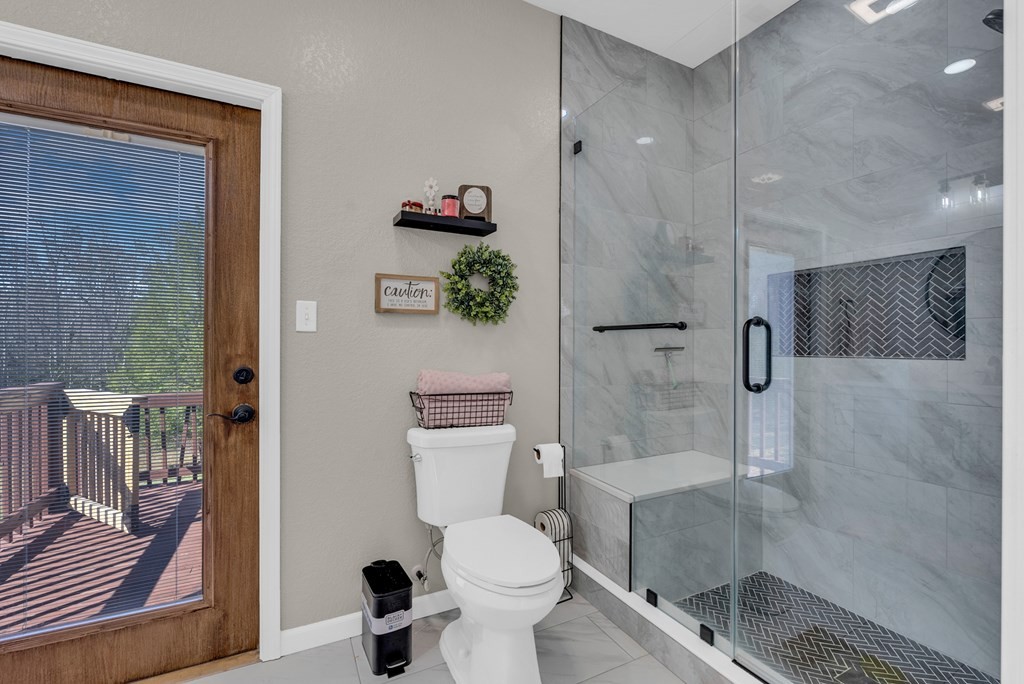 700 Falls Road Monterey, TN 38574 - Photo 28 of 69 a bathroom with a toilet and a shower