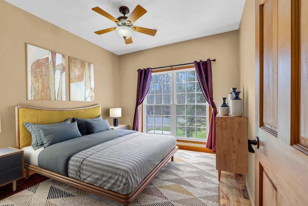 700 Falls Road Monterey, TN 38574 - Photo 31 of 72 a bedroom with a large bed and a window