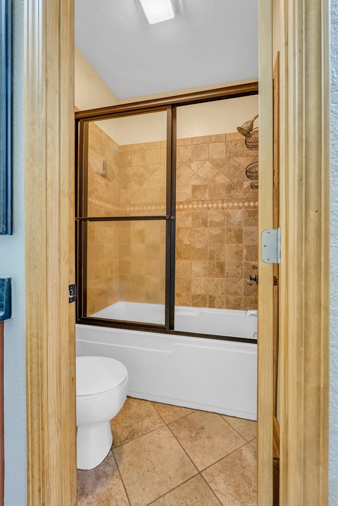 700 Falls Road Monterey, TN 38574 - Photo 39 of 69 a bathroom with a large window and a shower