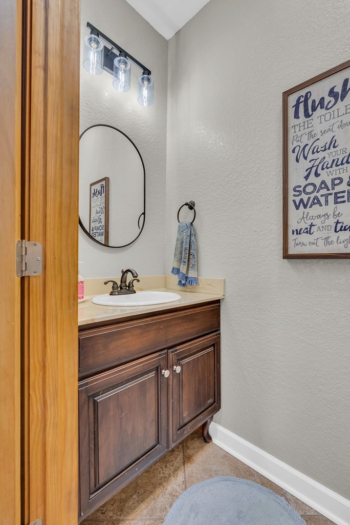 700 Falls Road Monterey, TN 38574 - Photo 40 of 69 a bathroom with a sink and a mirror
