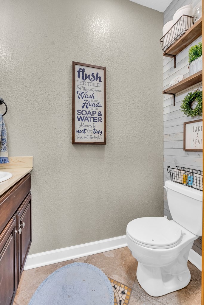 700 Falls Road Monterey, TN 38574 - Photo 40 of 72 a white toilet sitting next to a bathroom sink