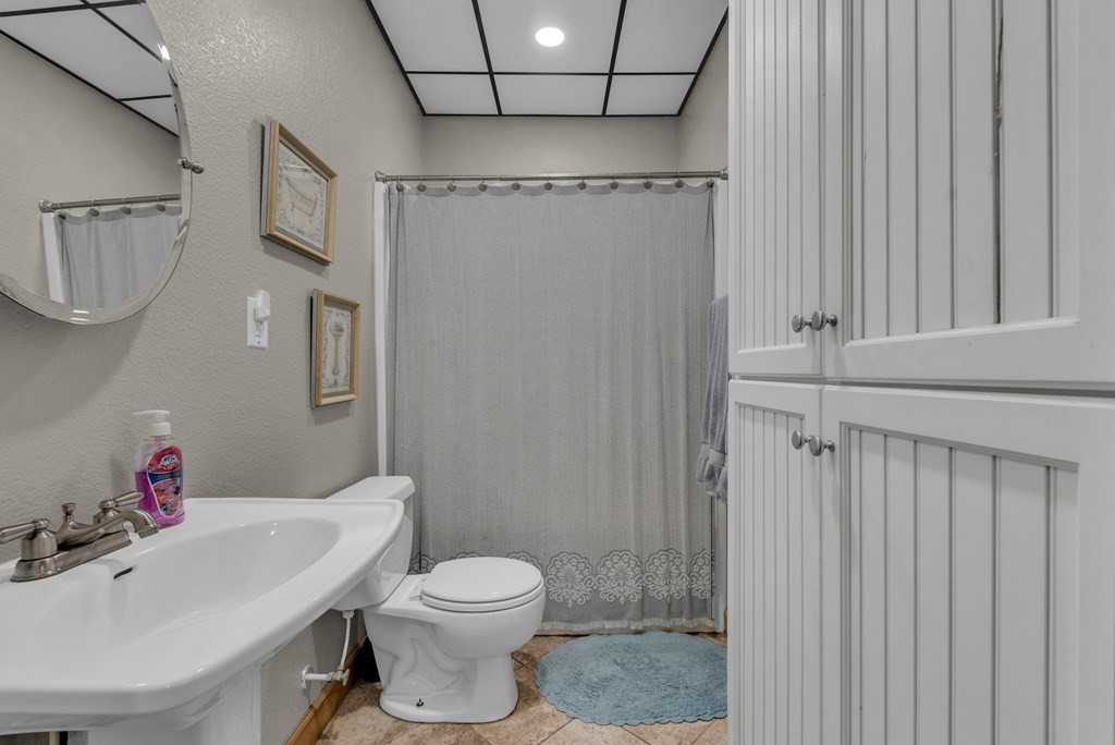 700 Falls Road Monterey, TN 38574 - Photo 51 of 72 a bathroom with a sink toilet and shower