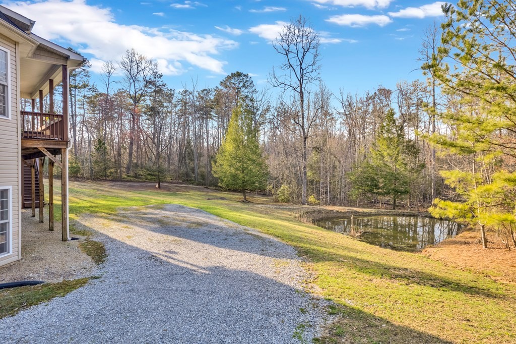 700 Falls Road Monterey, TN 38574 - Photo 58 of 69 a view of a swimming pool with an outdoor space and seating area