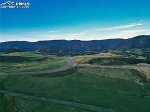 a view of an mountain with outdoor space yard
