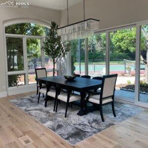 5499 Remuda Rnch Parkway Sedalia, CO 80135 - Photo 6 of 19 a view of a dining room with furniture window and outside view