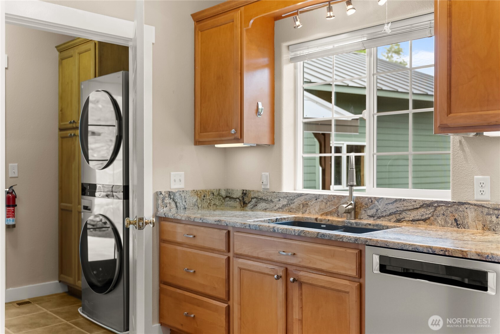 183 Twisp Carlton Road Carlton, WA 98814 - Photo 11 of 40 a sink with a granite countertop window and a sink