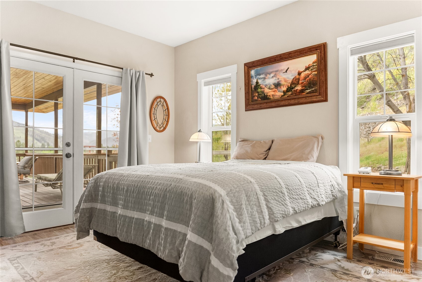 183 Twisp Carlton Road Carlton, WA 98814 - Photo 24 of 40 a bedroom with a large bed and a window