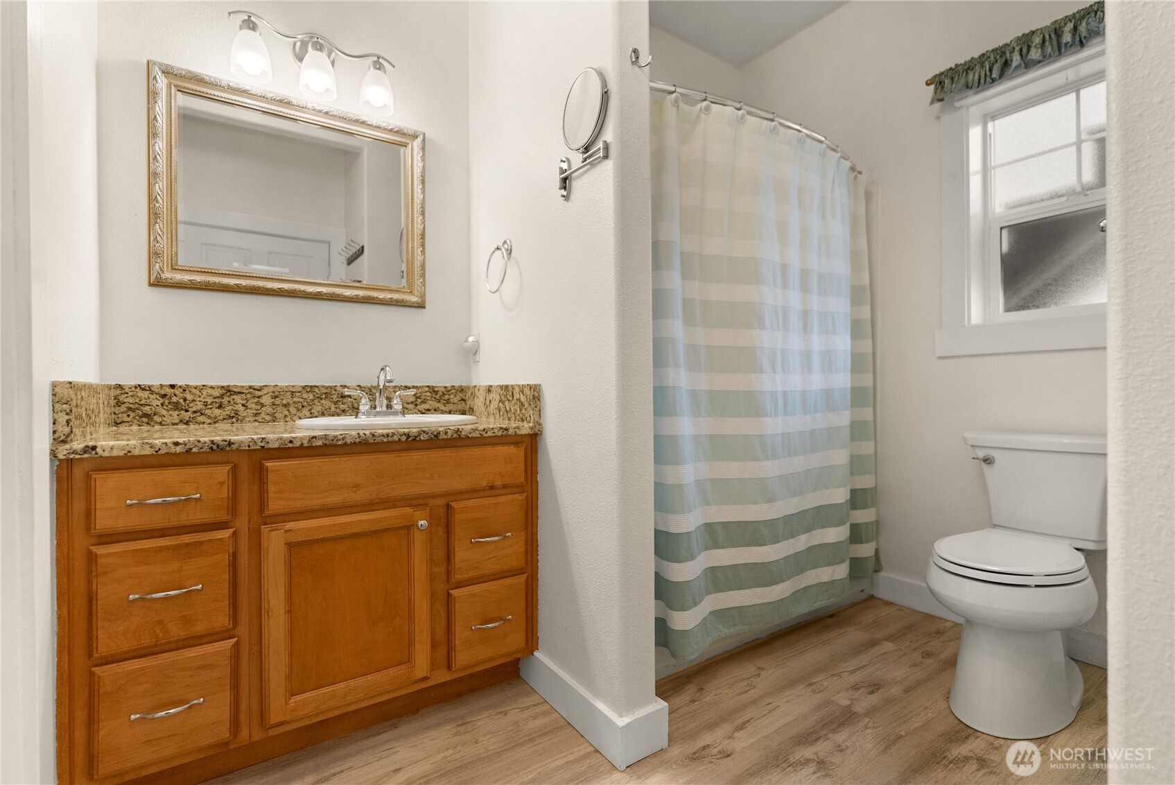 183 Twisp Carlton Road Carlton, WA 98814 - Photo 28 of 40 a bathroom with a granite countertop sink toilet and shower