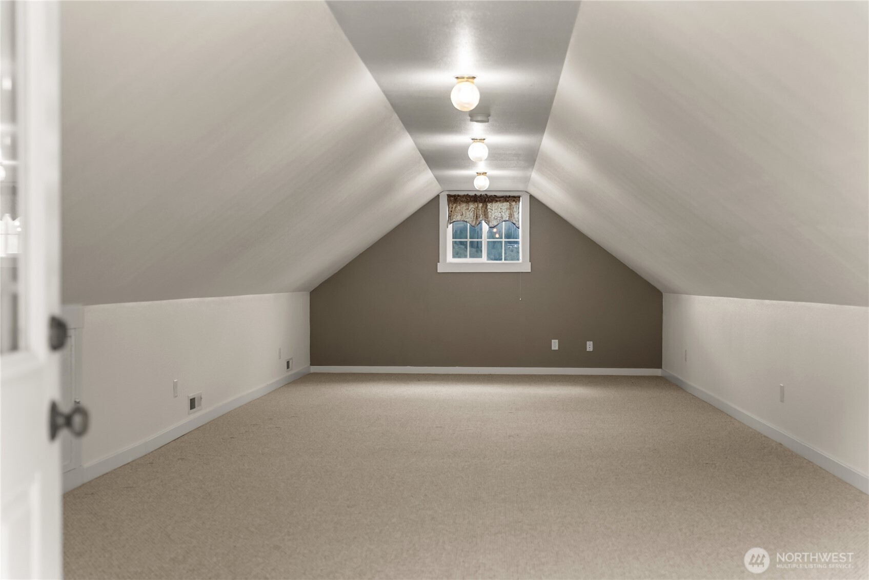 183 Twisp Carlton Road Carlton, WA 98814 - Photo 34 of 40 an empty room with stairs and chandelier