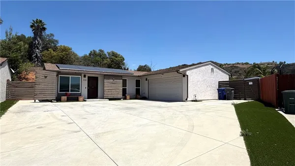 a front view of house with yard