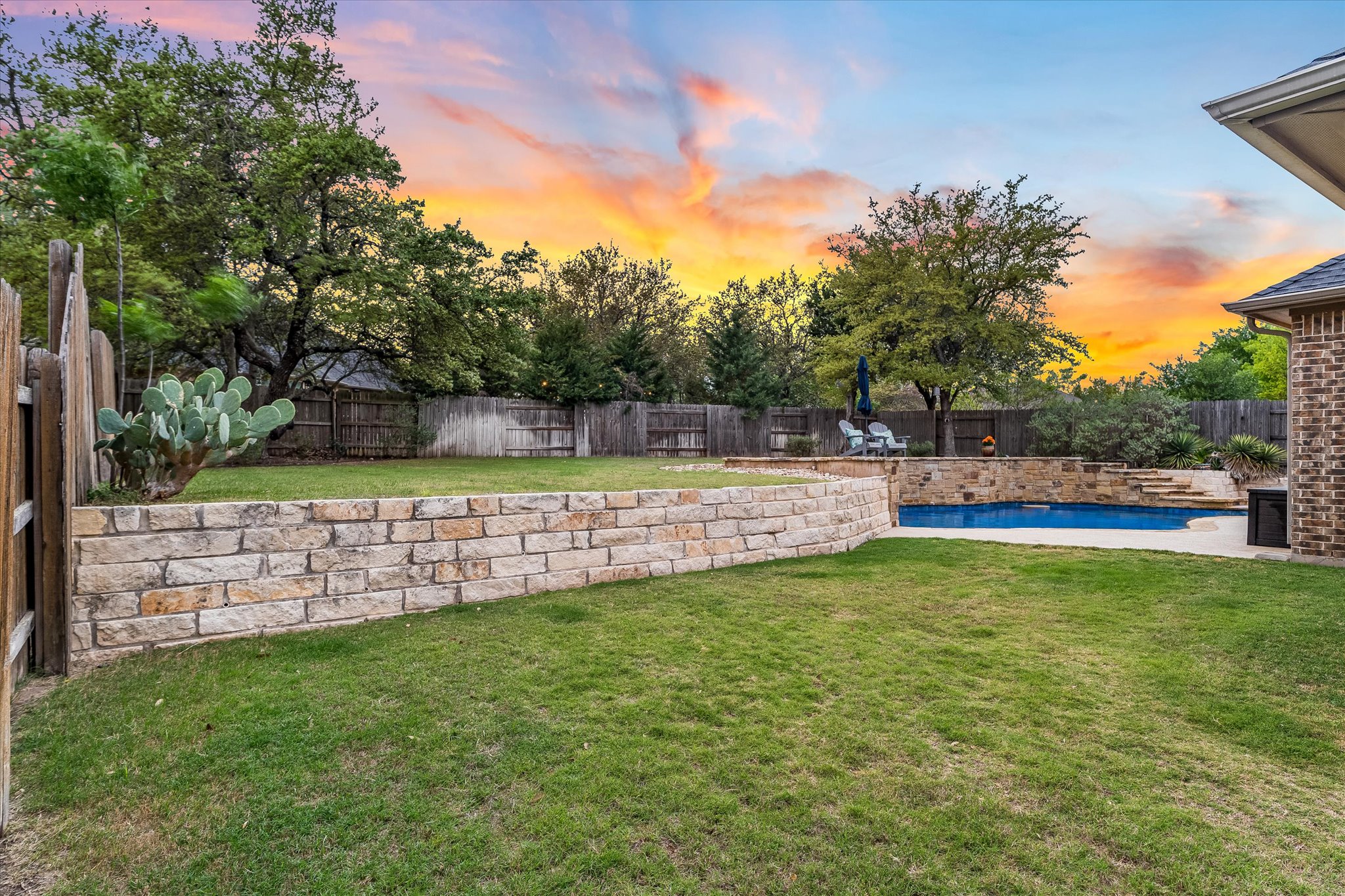 226 Galloway Lane Austin, TX 78737 - Photo 29 of 30 Fenced backyard with a patio