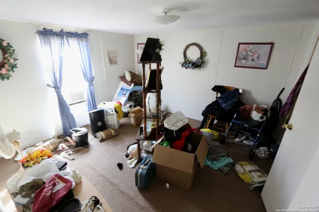 a bathroom with sink mirror vanity and toilet