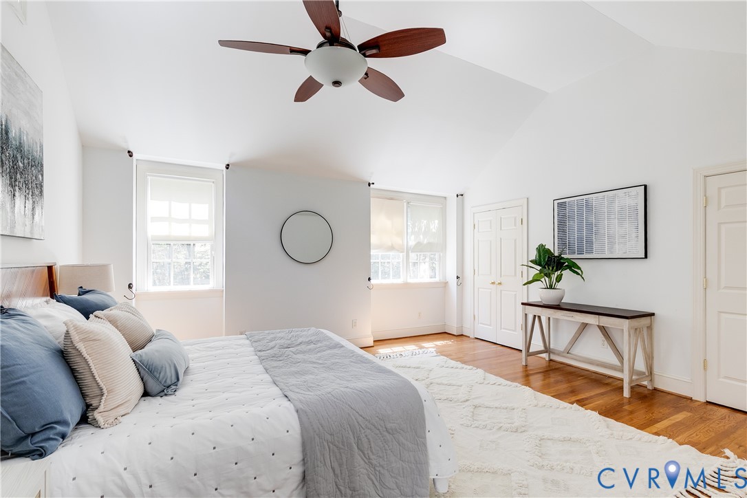 509 Wadeward Road Henrico, VA 23229 - Photo 43 of 59 a bedroom with a bed chandelier and a window