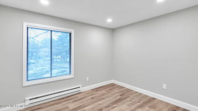 an empty room with window