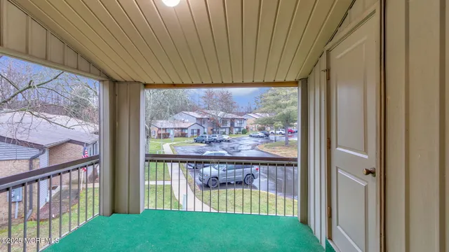 a view of swimming pool from a balcony