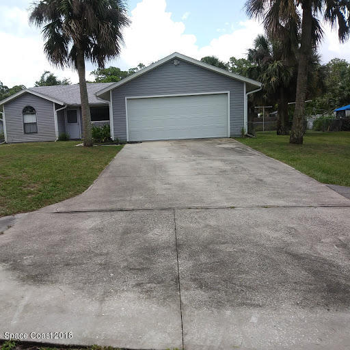 8245 Fleming Grant Road Micco, FL 32976 - Photo 1 of 22 FRONT