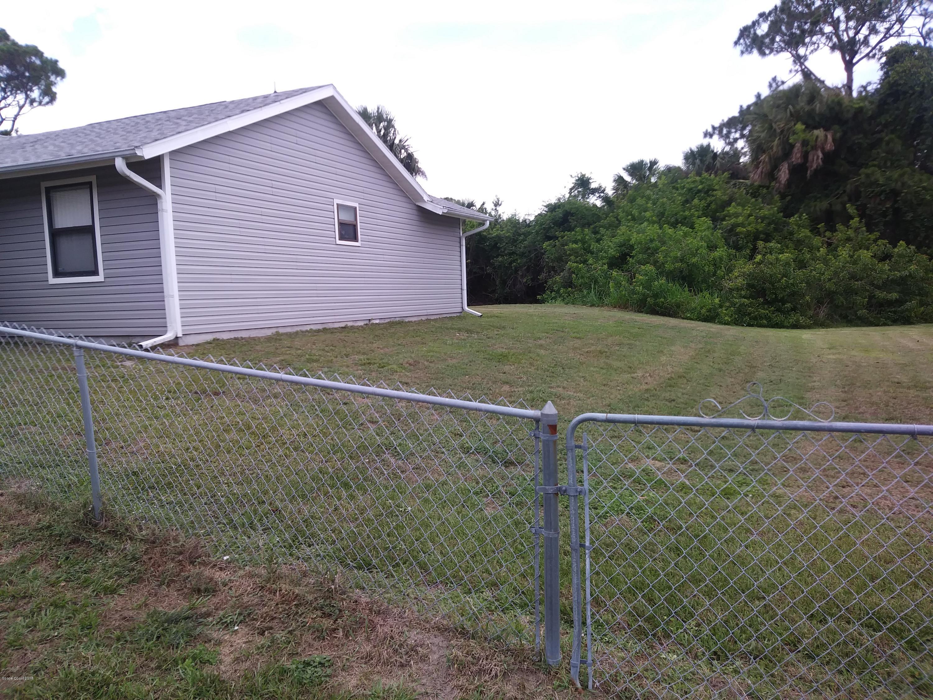 8245 Fleming Grant Road Micco, FL 32976 - Photo 7 of 22 20180515_131512