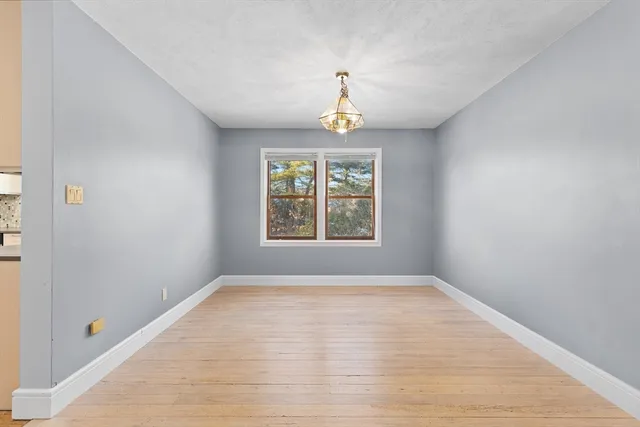 a bathroom with sink a mirror a bathtub and shower