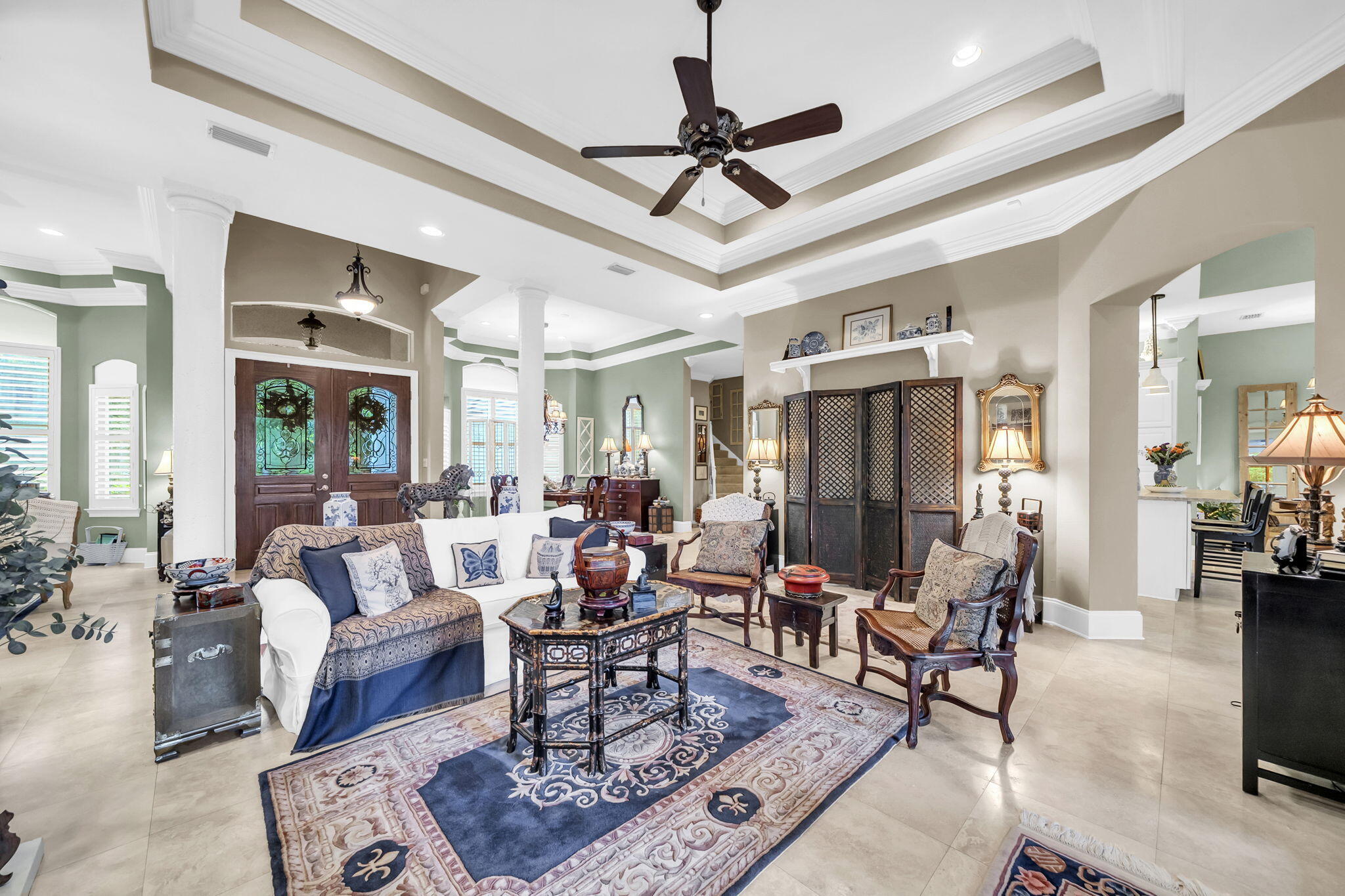 4470 Stonebridge Road Destin, FL 32541 - Photo 12 of 114 a living room with furniture a ceiling fan and a rug