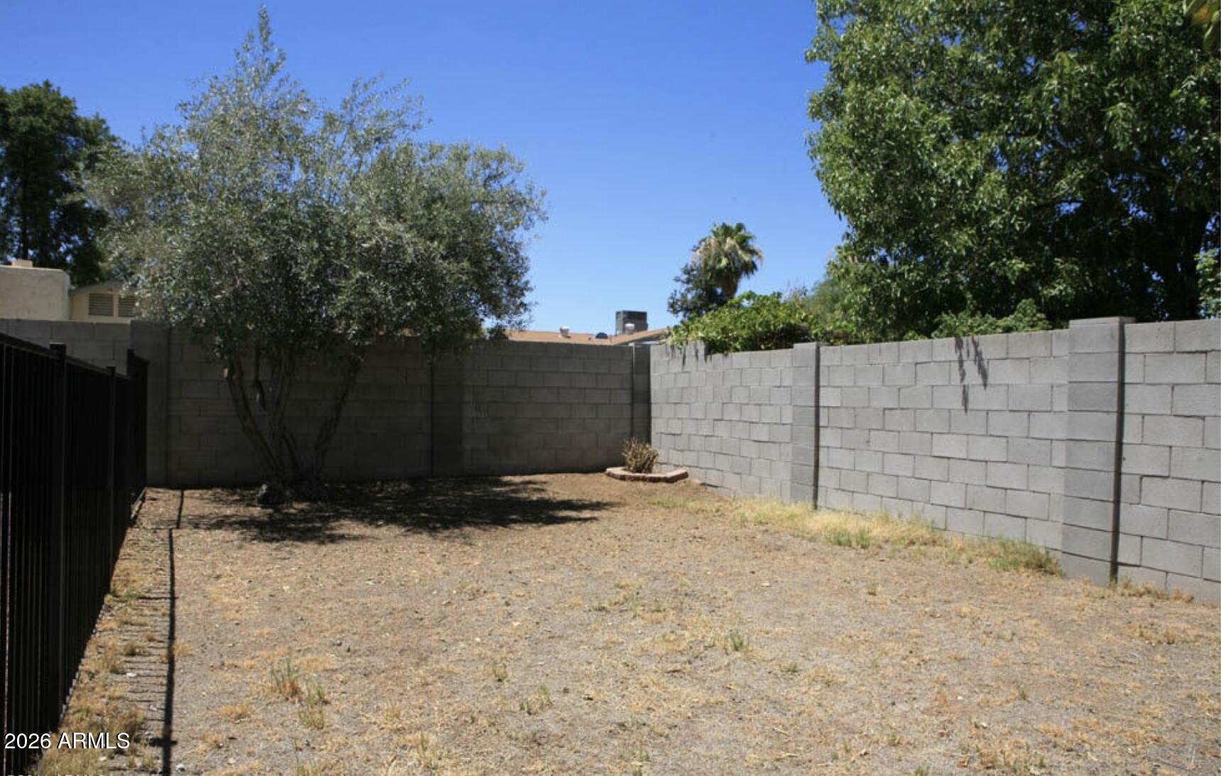 911 West Colgate Drive Tempe, AZ 85283 - Photo 13 of 15 a backyard of a house