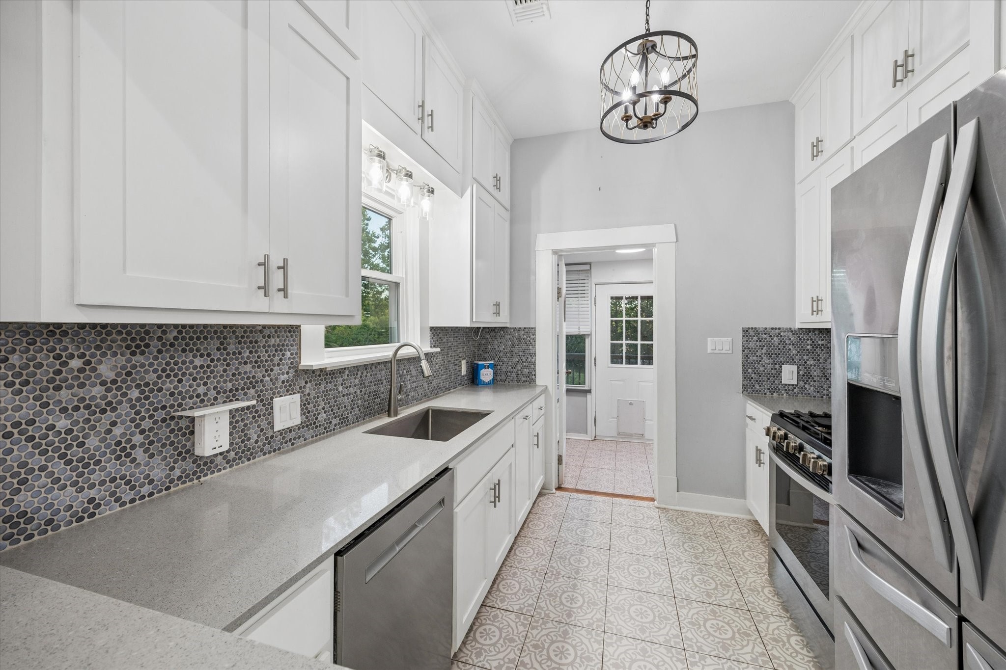 10347 Pless Road Cat Spring, TX 78933 - Photo 13 of 41 Beautifully updated kitchen with stainless steel finishes.