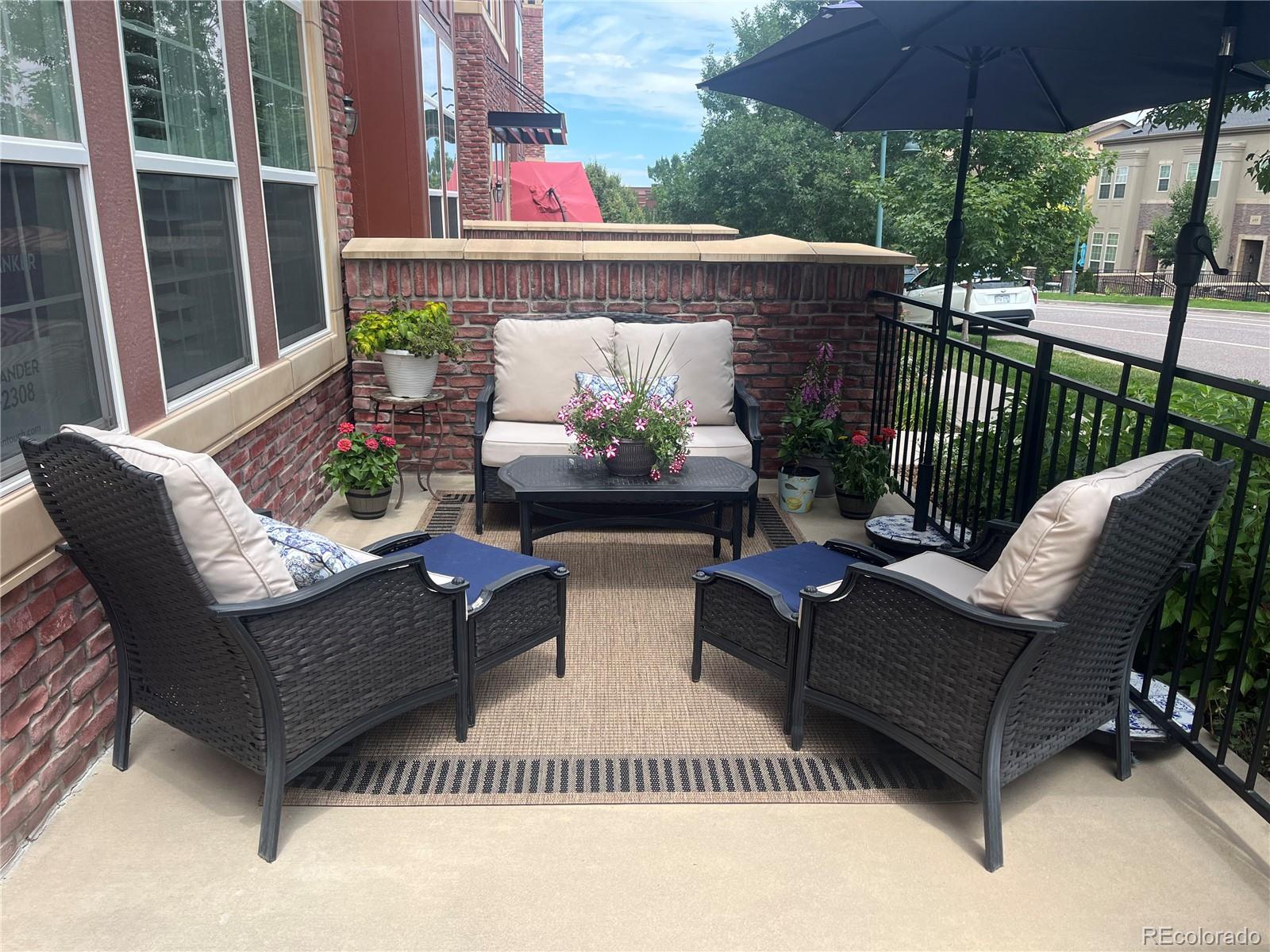 674 Bristle Pine Circle, Unit D Highlands Ranch, CO 80129 - Photo 1 of 31 a view of a patio on the roof deck