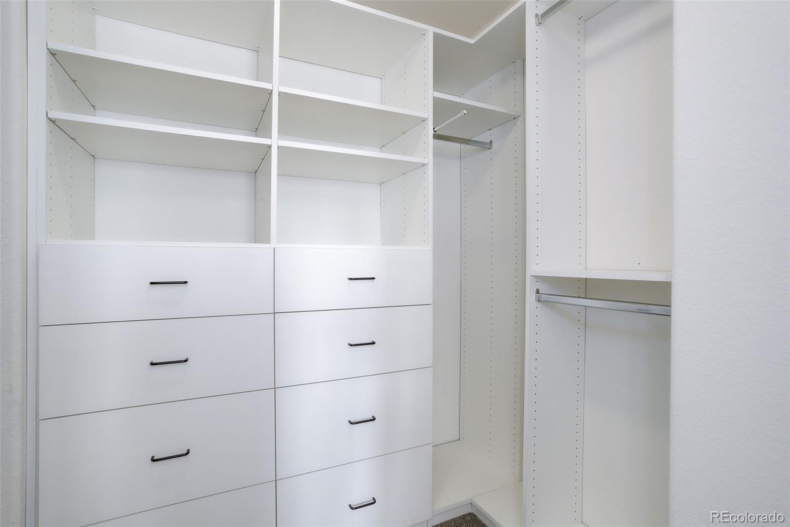 674 Bristle Pine Circle, Unit D Highlands Ranch, CO 80129 - Photo 7 of 31 a view of walk in closet