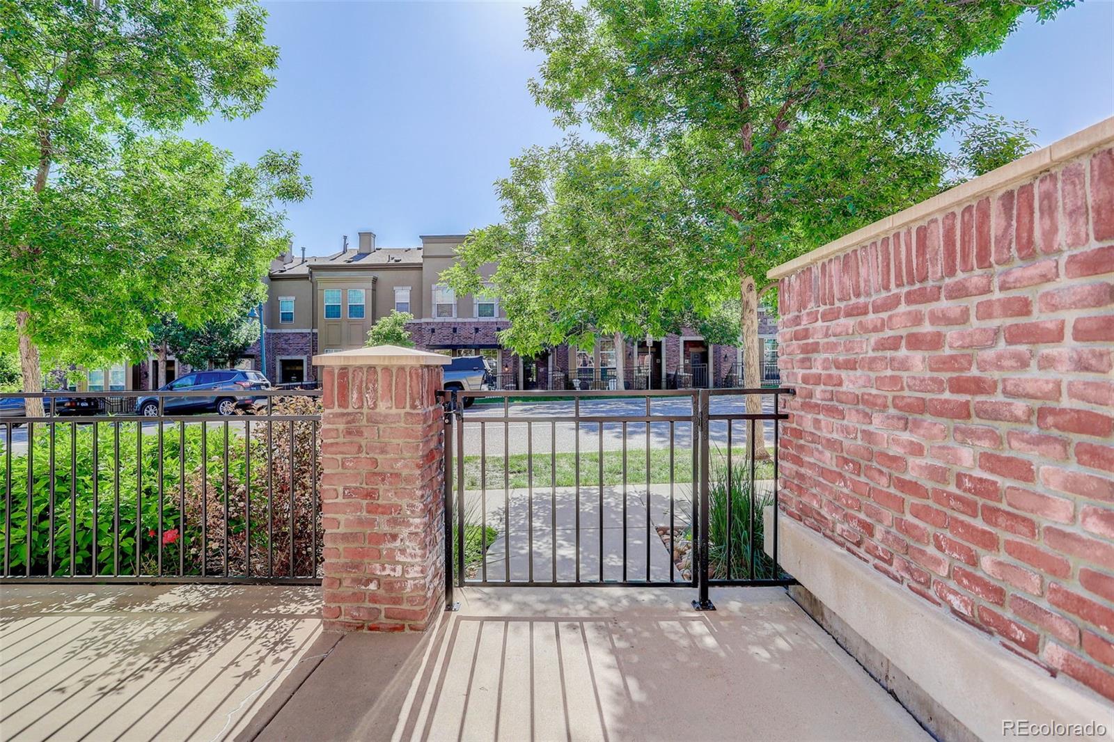 674 Bristle Pine Circle, Unit D Highlands Ranch, CO 80129 - Photo 10 of 31 a view of a balcony with a swing