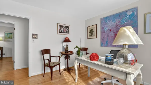 a table room with furniture and a wooden floor