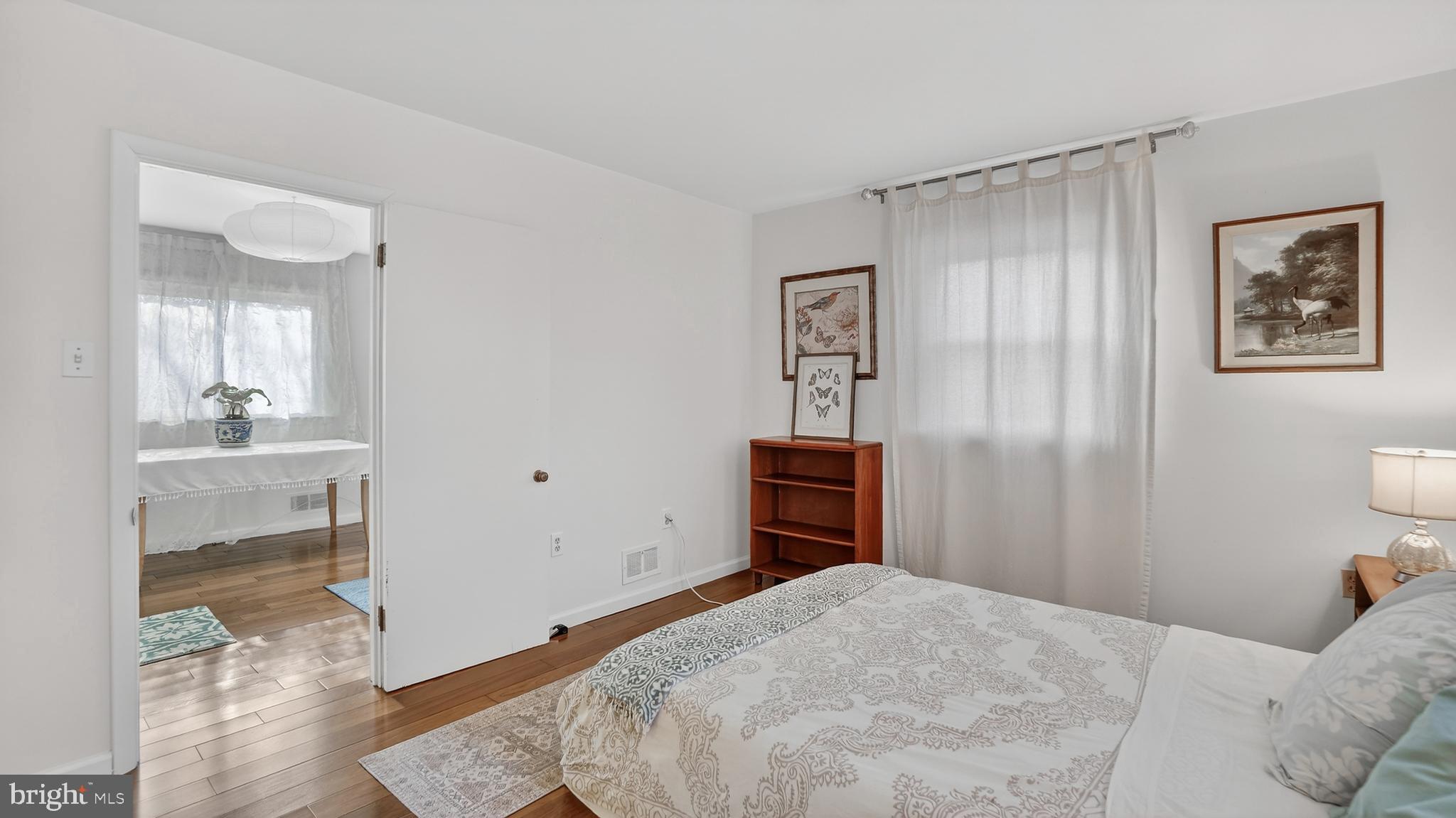 206 Mountain Road Linthicum Heights, MD 21090 - Photo 35 of 53 a bedroom with a bed and a view of bathroom