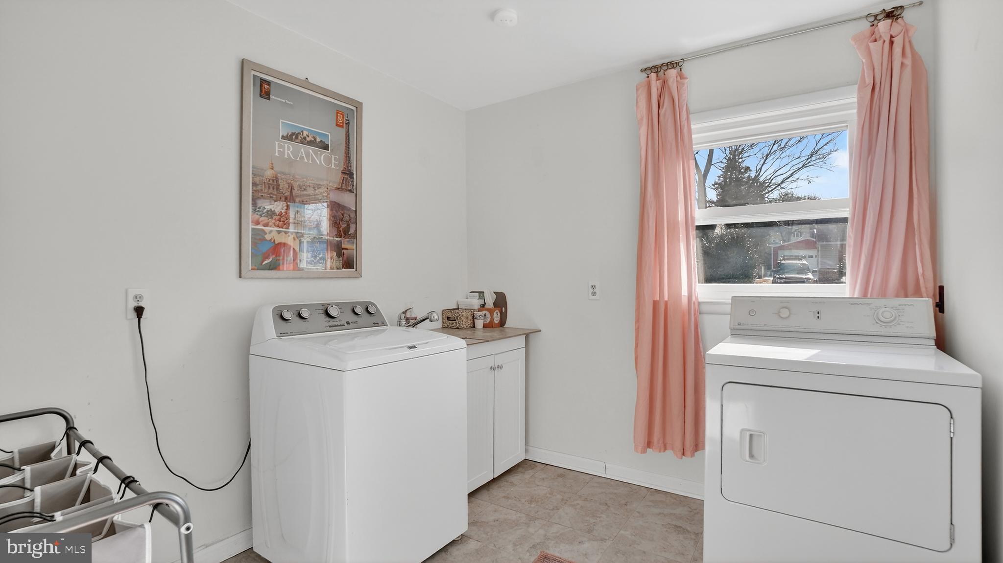 206 Mountain Road Linthicum Heights, MD 21090 - Photo 42 of 53 a utility room with dryer and washer