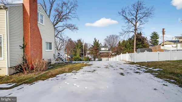 a view of a room with wooden walls
