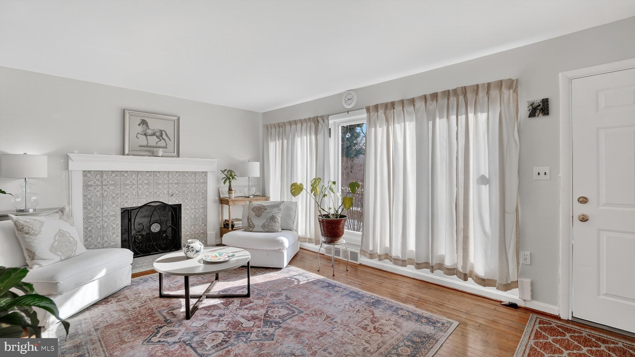206 Mountain Road Linthicum Heights, MD 21090 - Photo 6 of 53 a living room with furniture and a fireplace