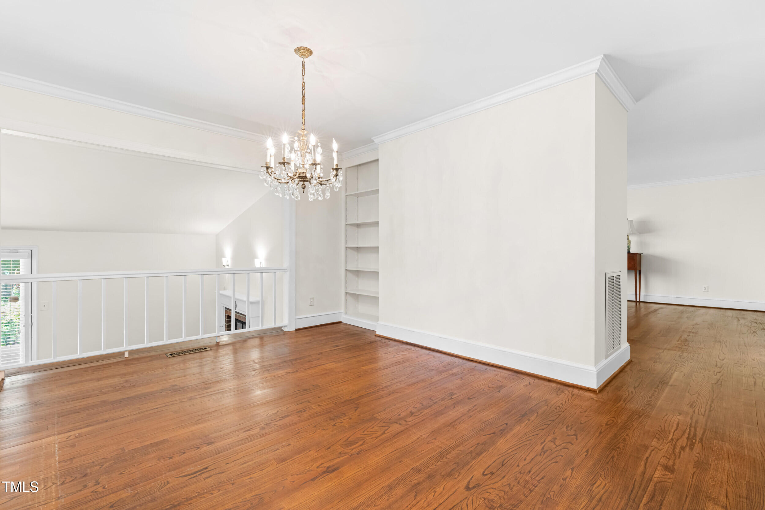 2143 Ridge Road Raleigh, NC 27607 - Photo 15 of 40 wooden floor in an empty room with a window