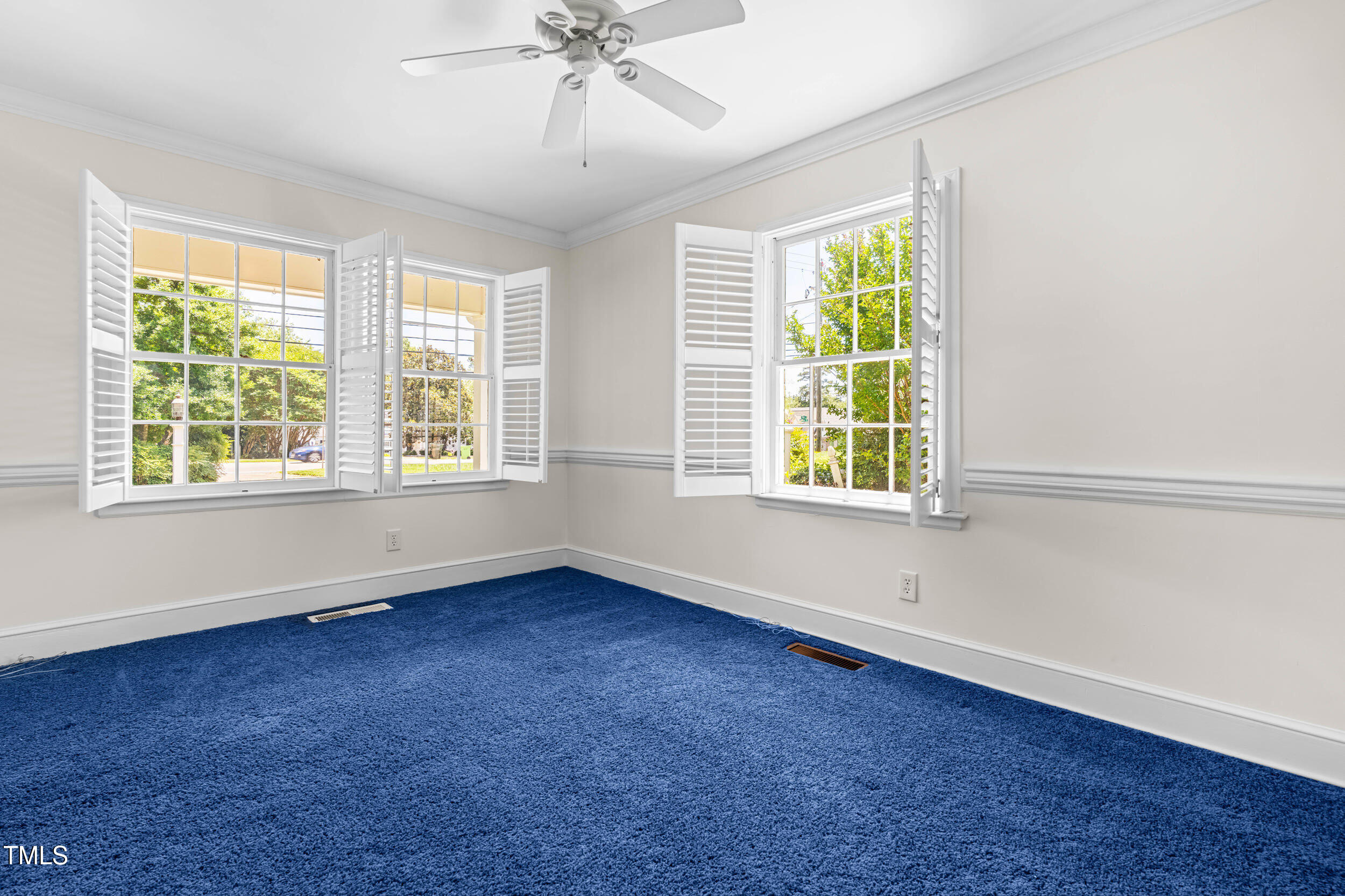 2143 Ridge Road Raleigh, NC 27607 - Photo 24 of 40 wooden floor in an empty room with a window